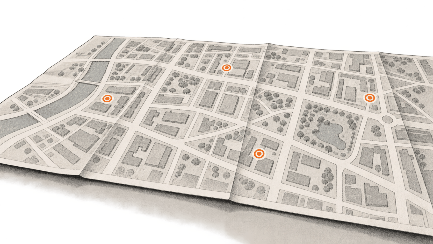 Conceptual charcoal illustration of a generic folded street map with four separate orange location markers.