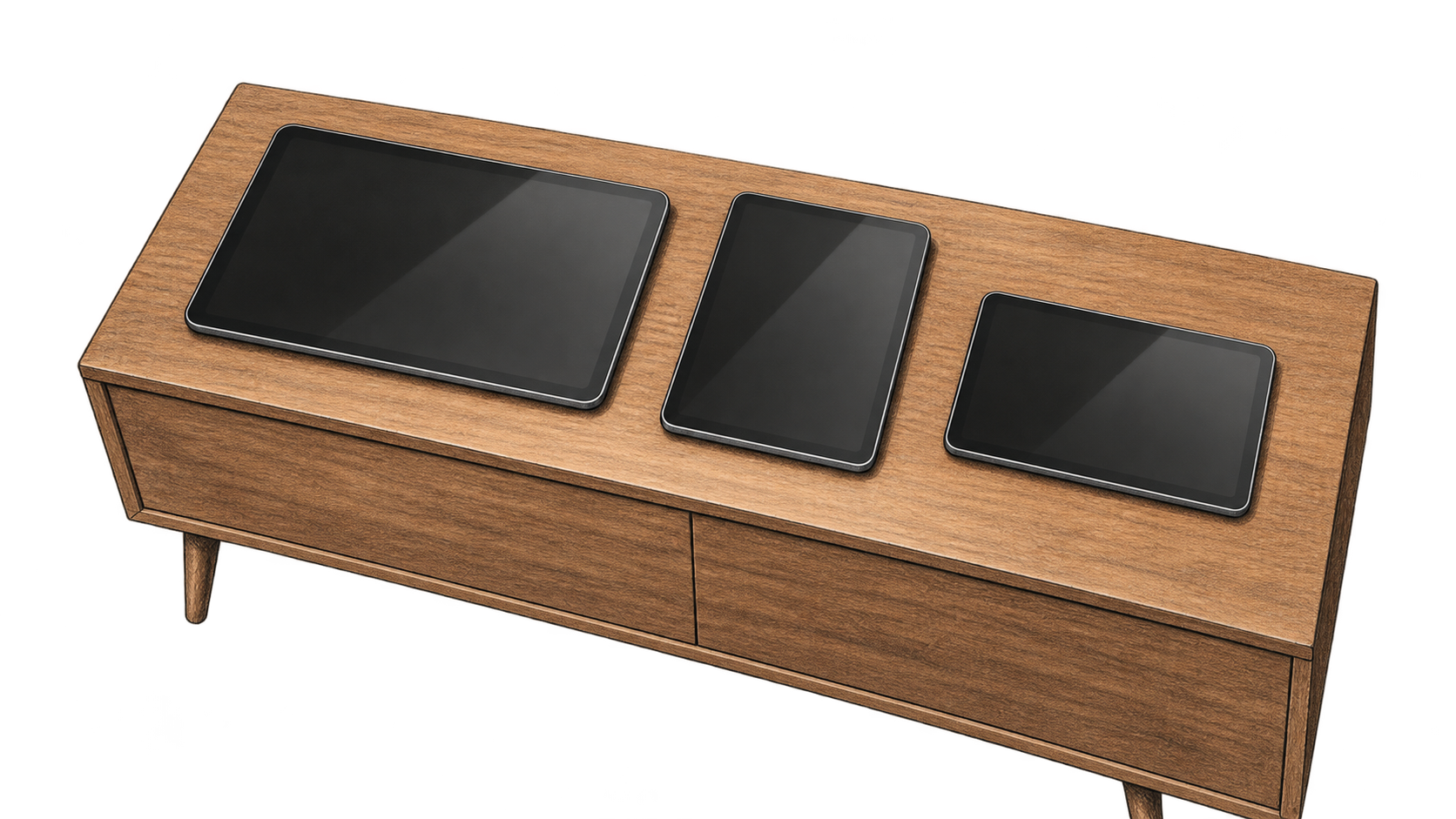 Three unbranded graphite tablets in descending sizes rest on a wooden sideboard, their blank dark screens reflecting light.